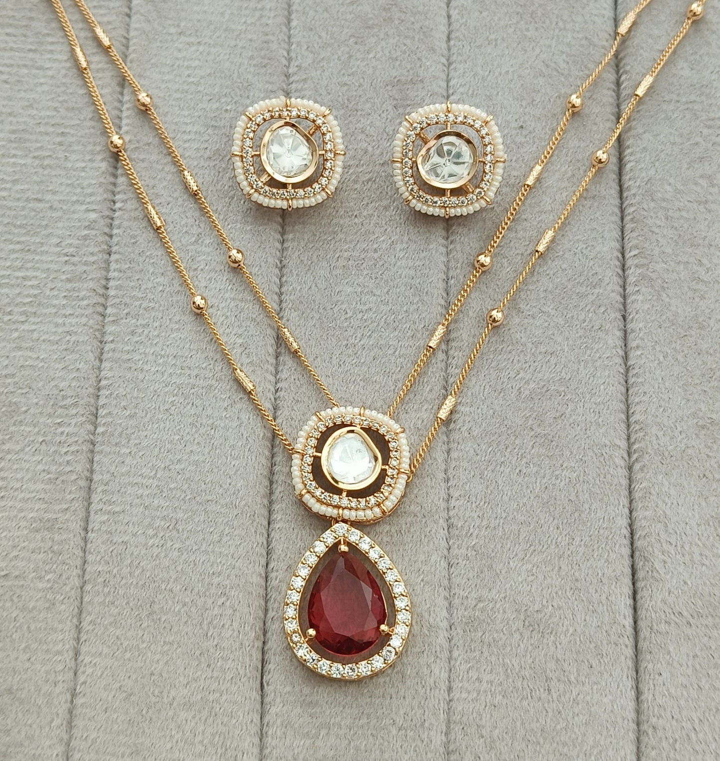 Cpds25 5s Ruby centred double chain pendant set