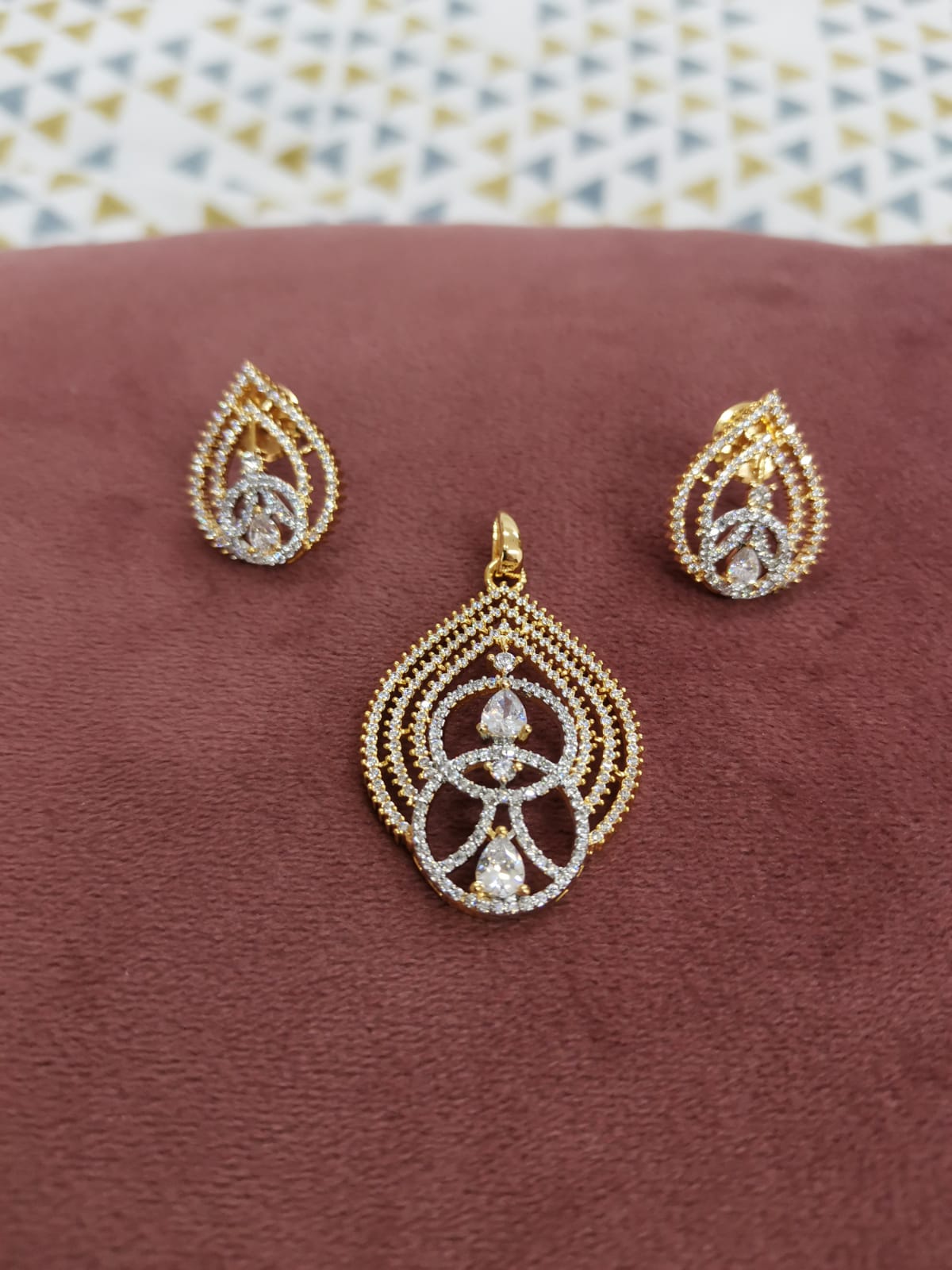Pds25 58 Luminous Grace: Gold-Plated American Diamond Pendant & Earring Set